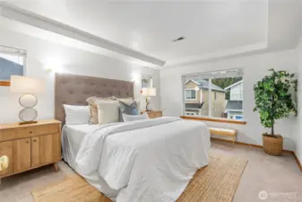 The primary suite, with classic tray ceiling, is a sanctuary of relaxation for you to wind down at the end of the day.