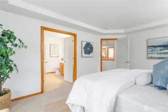 The primary suite is separated from the other bedrooms, providing privacy and space.