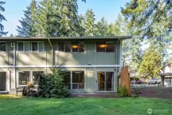 A view from the back yard. There's plenty of room for outdoor living here!