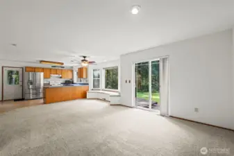 Livingroom with slider to back deck.