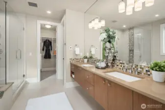 Ensuite bath with double vanity offering plenty of storage space