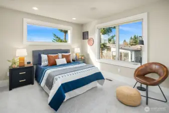 Upper-level bedroom with adjacent 3/4 bath