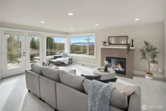 Upper-level recreation room with gas fireplace, gorgeous views and a large balcony to take it all in!