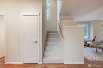 Be sure to check out the large storage area inside this closet! It goes around the corner, under the stairs.