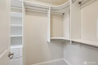 Custom shelving in the primary bedroom walk in closet.