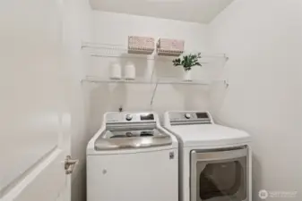 Laundry room with included washer and dryer.