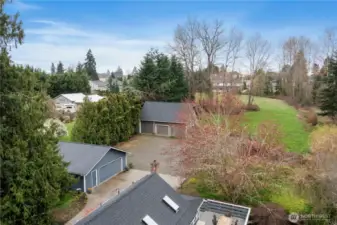 Detached 24x30 finished garage with 24x36 shop on over two acres.