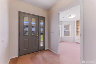 Front door with door to office/bedroom