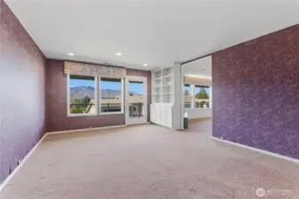 Den off of living room and access to deck.