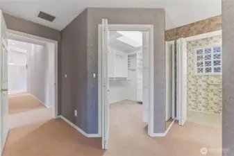 large Primary Closet with natural lighting