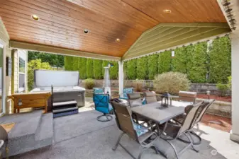 Covered patio with hot tub