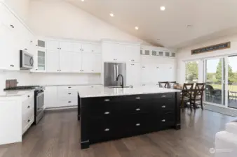 Huge kitchen opens up to the rest of the home