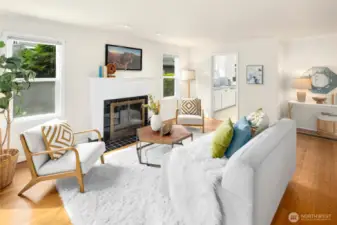 A perfect blend of original charm and simple style, clean lines and natural light give the living room a calm, airy vibe.