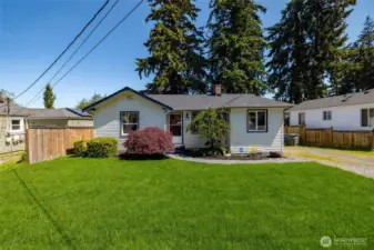 Welcome Home !  Darling cottage with 2 bedrooms and 2 baths, sitting in a wonderful neighborhood that shows pride of ownership. Brand new sod yard in front. New Roof, Vinyl siding and Vinyl windows too.
