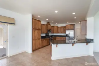 Open Concept Kitchen with custom cabinetry.