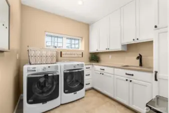 Full laundry room with sink!
