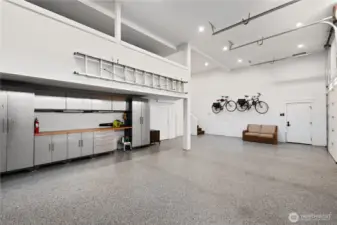 3 car garage with storage balcony
