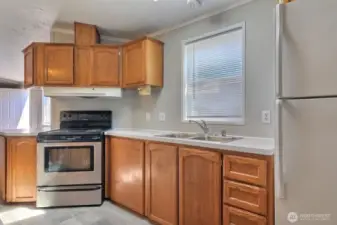 Kitchen with stove & Refrigerator