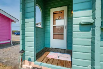 Pan Abode style. covered front entry. These cottages are on cement foundations with crawl space.