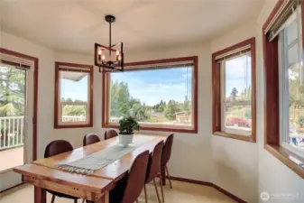 The dining area is spacious and open to the kitchen and living area.