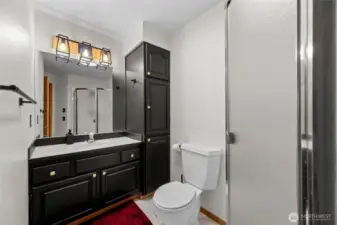 Lower 3/4 bath with plenty of storage.