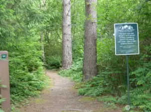 This the Skagit Land Trust trail head just steps from the property.