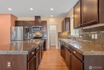 Walk in pantry in the distance. Tons of counter space.