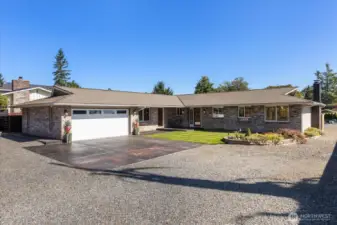 Welcome home to this fully updated single-story rambler with a 504 sqft attached garage and a 960 sqft detached shop, set on a private lot in the heart of Lake Stevens with mountain views!