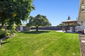 0.37 acre property with private and fully fenced yard. Double gate perfect for secure RV and boat parking.