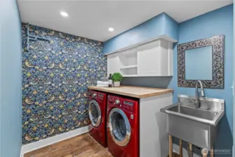 Laundry room on lower level with sink
