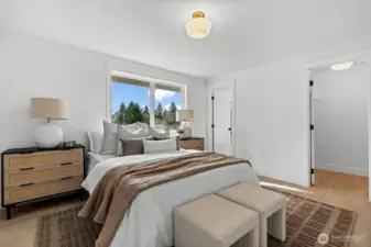 This gorgeous primary suite is coupled with it's own en-suite bathroom and walk-in closet.