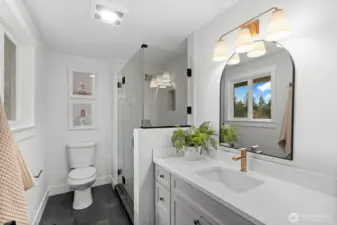 Focusing on high-end appliances and spatial consistency, this primary en-suite establishes a standard of luxury that is both visual and tactile.