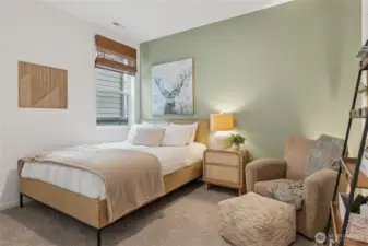 Main floor bedroom and 3/4 bath for guests. Actual home is under construction and finishes, materials, and colors will vary. See site agent for details.