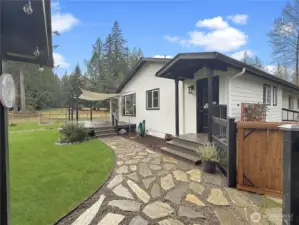 Side view from the garage to the mud/laundry room and back deck.