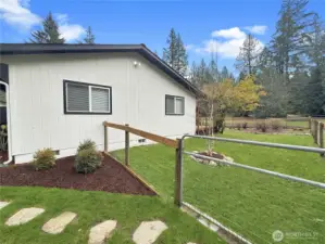 Back yard has it's own fencing to keep animals off if you wish.