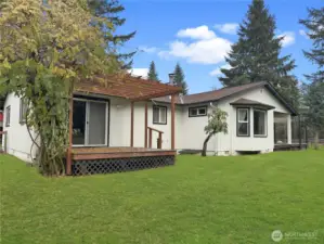 Deck with Wisteria off primary bedroom.