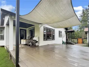 Masive deck so you can enjoy the beautifully maintained lanscape.