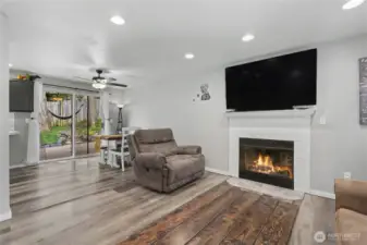 View of your family room to dining room, love the large sliding glass doors leading to your large deck.