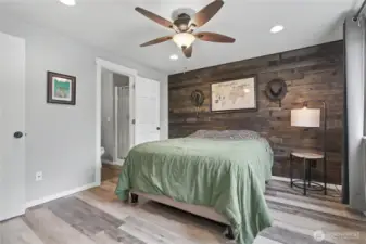 Primary ensuite bedroom, nicely sized, large windows and the shiplap is fun, paint or stain it to your liking!