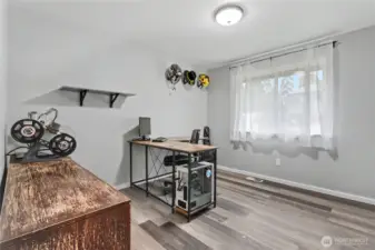 Bedroom #2, currently used as an office/gaming room.