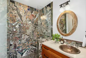 Distinctive, artfully curated main floor bathroom.