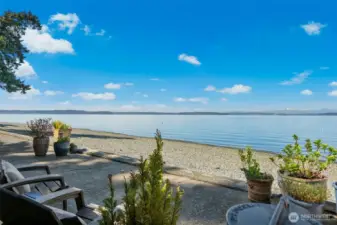 Sun filled space where every moment is touched by water + sky.