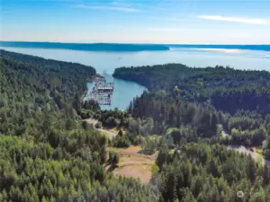 Views to the E with Pleasant Harbor in the foreground, Hood Canal mid and the Cascade Range background.