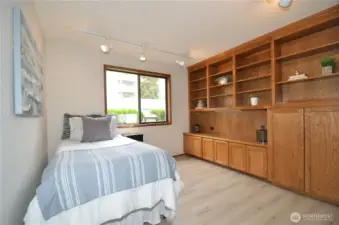 2nd bedroom staged with bed. Seller had queen sized bed in here. Good sized room.