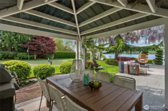 Covered cabana is designed for an outdoor kitchen and wired for a hot tub.