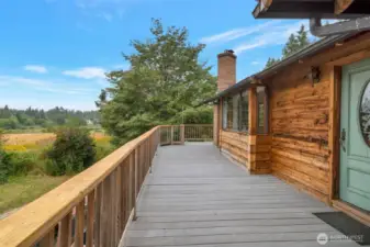 View on the deck by front door. Wrap around deck.