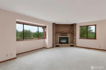 Living room with fireplace and great views