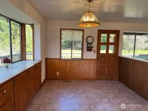 Dining Room with Kitchen to the right.