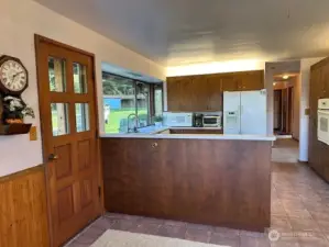 Looking into the kitchen from the dining room.