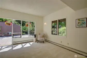 Primary bedroom open up to large private deck to enjoy your morning coffee!